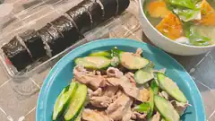 sushi roll and plates of food
