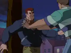 Venom transforms and throws Eddie Brock
