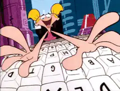 Dexter typing on a giant keyboard