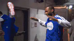 Chelsea players celebrating in hallway