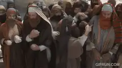 Jesus turns and sees the crowd