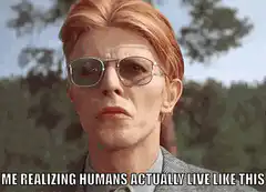 David Bowie as Major Tom realizing humans live like this