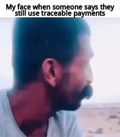Man turns and laughs at traceable payments