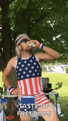 Man in USA outfit drinking