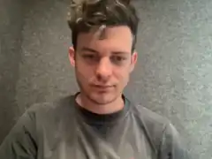 Man looking down with tired eyes