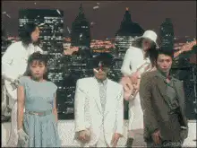 New Kids on the Block dancing on rooftop