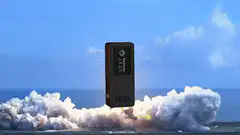 Jade device floating over explosion