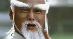 Old man with white eyebrows and beard