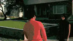 Man kisses woman's face