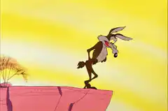 Wile E. Coyote falls off cliff