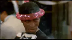 Man wearing pink balloon hat