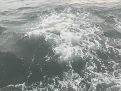 Churning ocean waves and foam