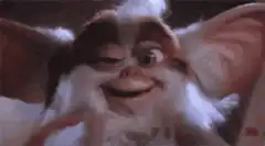 Gremlin winking and smiling