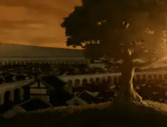 Old man stands on hill overlooking city
