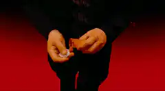 Jason Statham eating a cookie