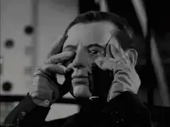 The Phantom puts on his mask