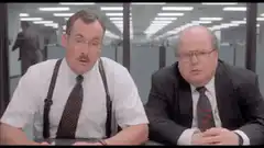 Two men in an office talking