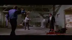 Three men pointing guns at each other