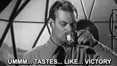 Man drinking tastes like victory