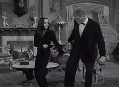 Morticia and Gomez Addams dancing