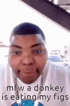 Man reacts to donkey eating figs