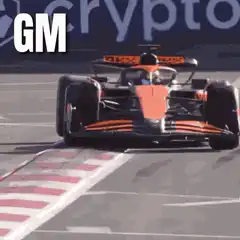 McLaren F1 car overtaking Ferrari