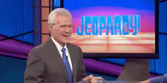 Alex Trebek clapping on Jeopardy!