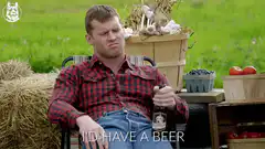 Man holding beer with vegetables