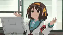 Haruhi Suzumiya shrugging at computer