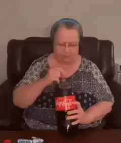 Woman gets sprayed by soda