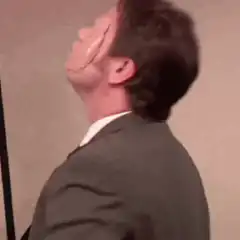 Man with scarred face looking up