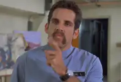 Ben Stiller pointing finger then eating