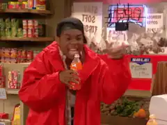 Trayce pointing with orange soda