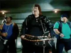 Fat cop dancing with his crew