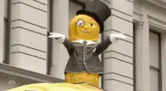 Minion in tuxedo waving