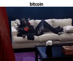 woman lounging on couch with bitcoin text