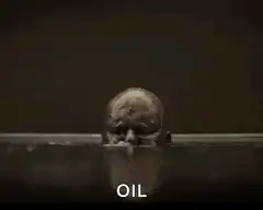 Man rising from oil
