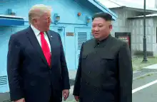 Donald Trump points at Kim Jong Un