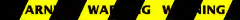 Warning text on yellow and black stripes