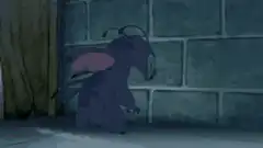 Stitch crying against a wall