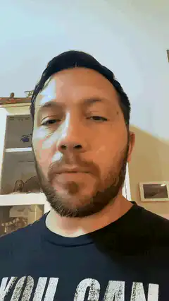 Man closing eyes and tilting head back