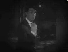 Buster Keaton surprised and turns