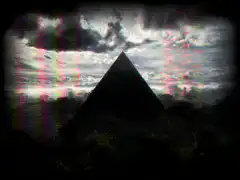 glitchy pyramid under stormy sky