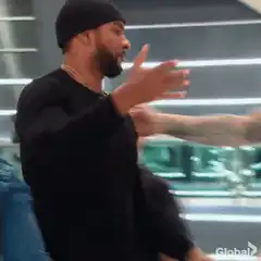 Two men hugging