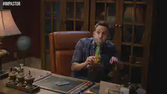 Ron Burgundy smoking a bong