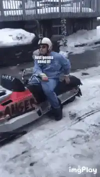 Man on snowmobile says Just gonna send it