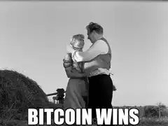 Man and woman kiss then run to windmill
