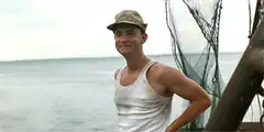 Forrest Gump waving on a boat