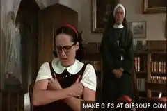Nun crying in a library