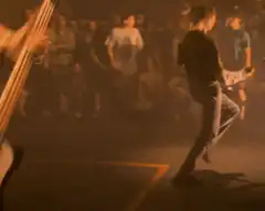 Guitarist headbanging on stage